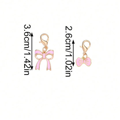 10-Piece Random Pink Bow Enamel Charms with Lobster Clasps